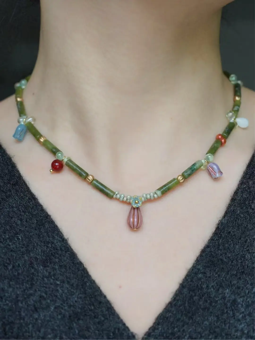 Customer wearing handmade necklace with retro-style Czech glass beads