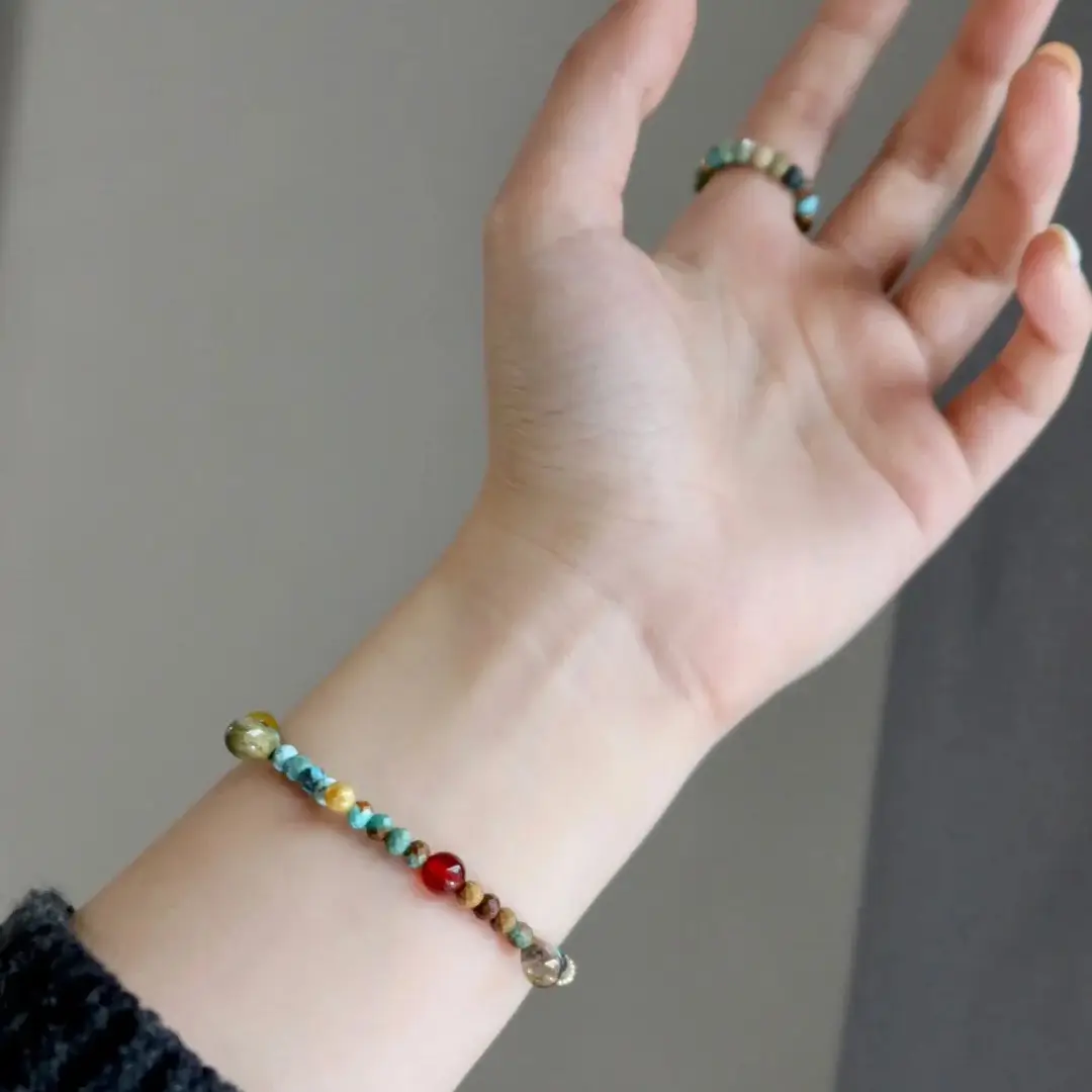 Handcrafted colorful bracelet captures vintage flair and expresses vibrant Bohemian charm through artisanal details.