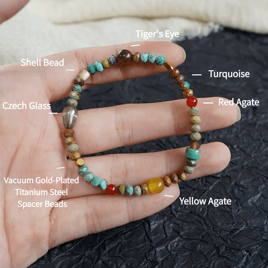 A hand holding a beaded boho bracelet with text labels pointing to each natural stone and bead material.