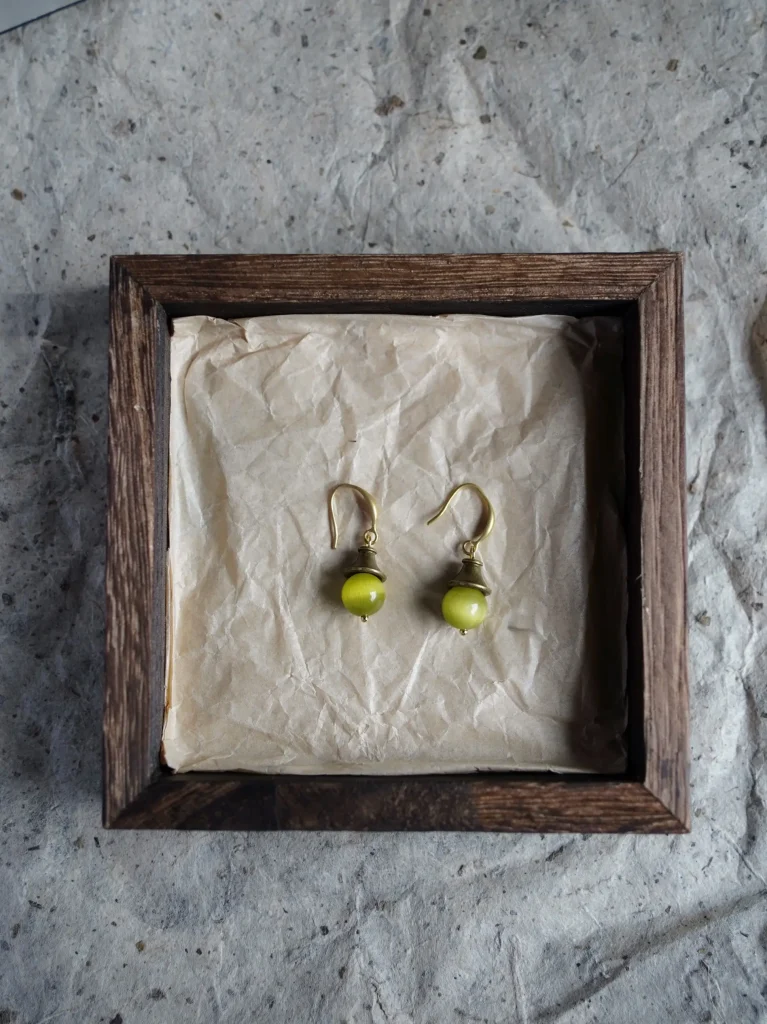 Handmade vintage green dangle earrings, ideal summer accessory for retro-inspired looks