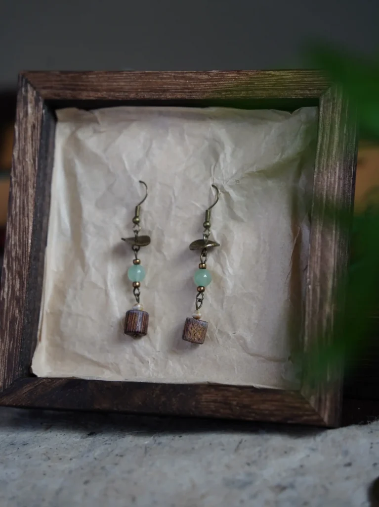 Original handmade earrings with green sandalwood pendants in vintage boho style