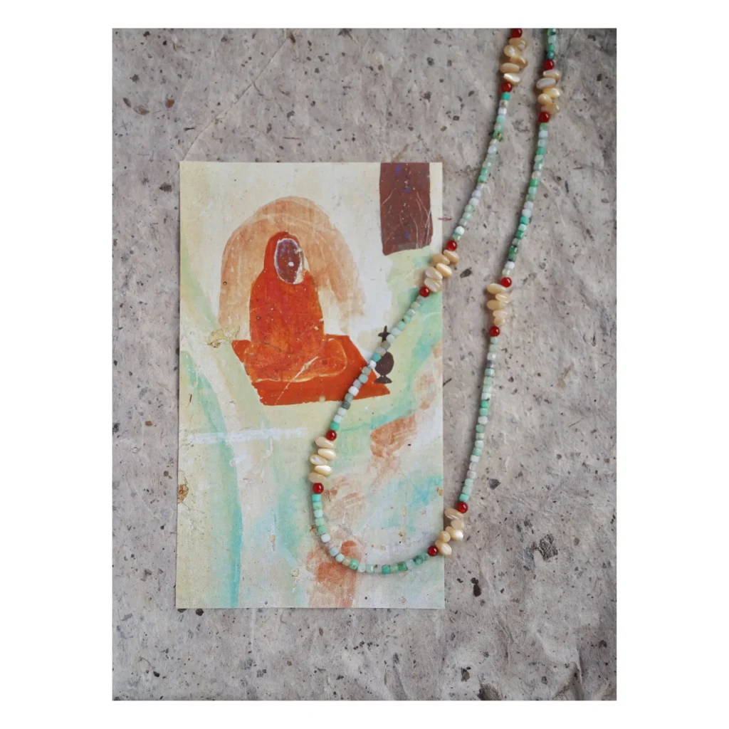  Australian jade handmade long necklace featuring red agate and horseshoe shell, a versatile accessory.