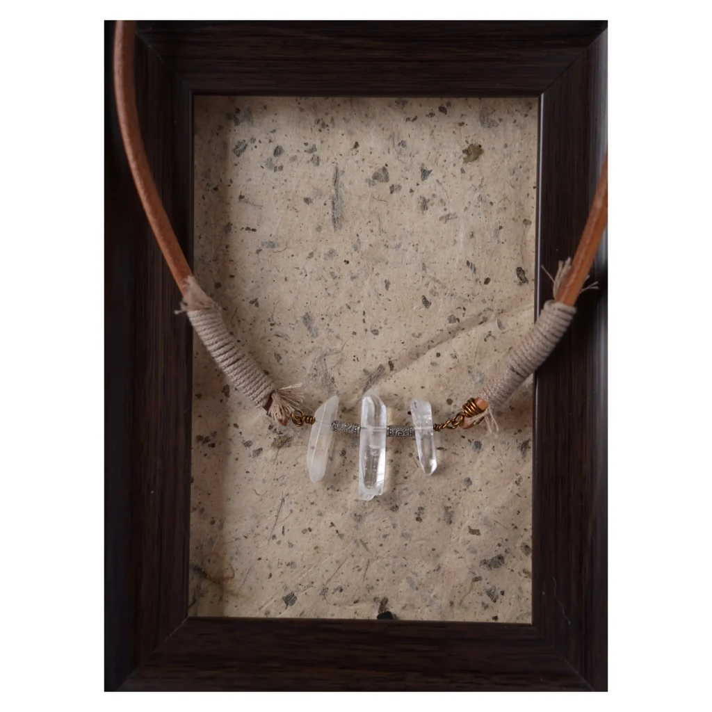 Natural handmade necklace features hand-wrapped Tibetan cotton thread for a rustic, organic finish.