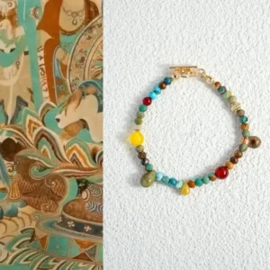Handmade turquoise bracelet showcases Boho charm with Dunhuang-inspired vintage design.