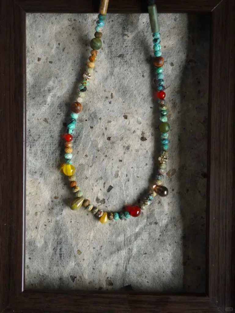 Turquoise handmade necklace showcases vibrant natural stones, adding bohemian charm to women’s everyday style.