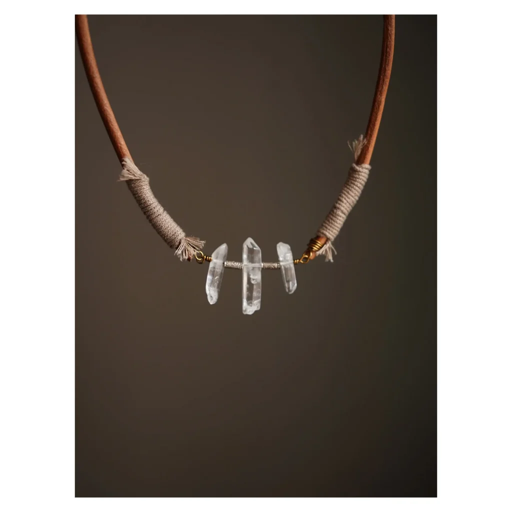 Healing crystal necklace highlights vintage charm with handmade Thai silver accents and a natural aesthetic.
