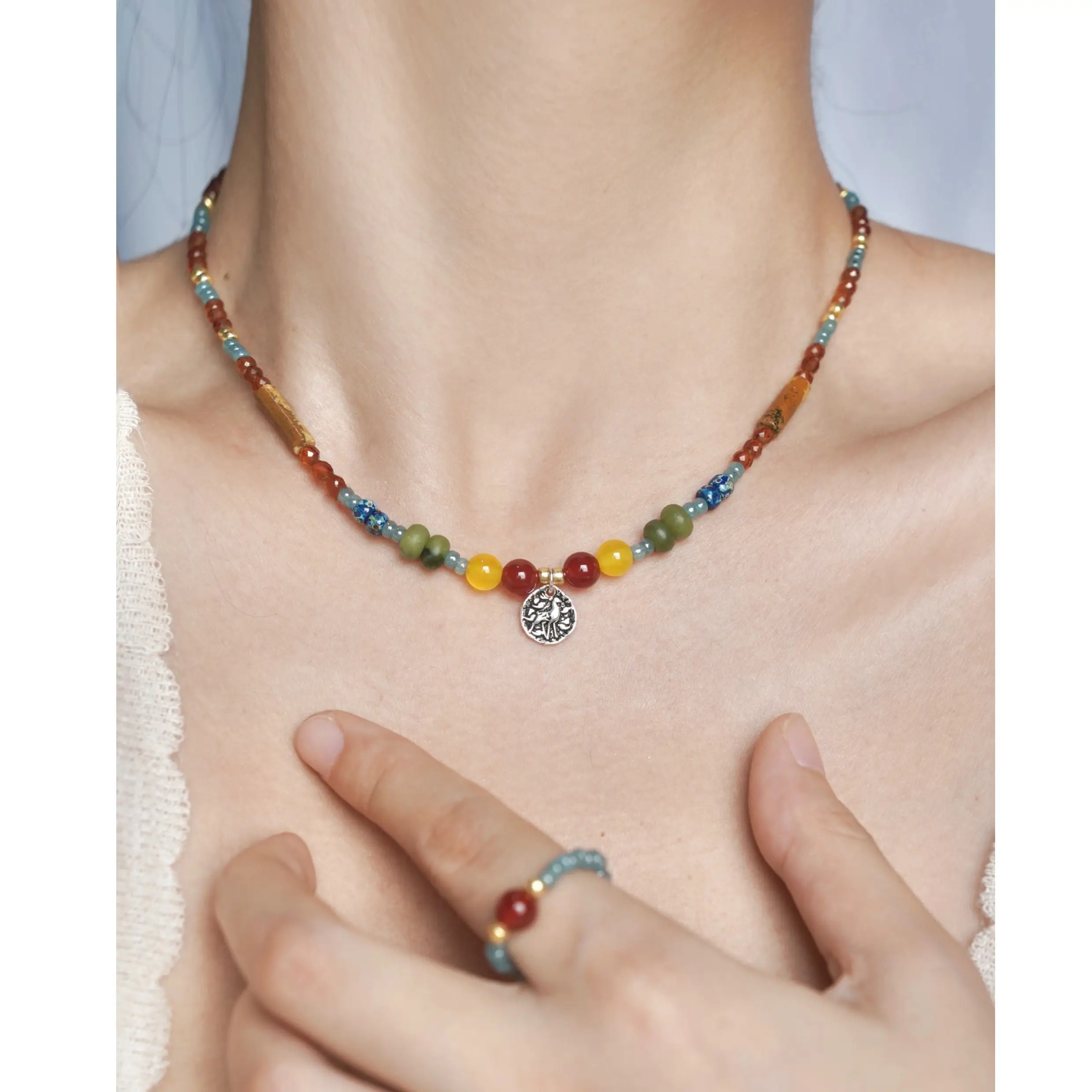 Model wearing the Nine-Colored Deer vintage necklace, showcasing unique oriental artistry and exquisite craftsmanship.