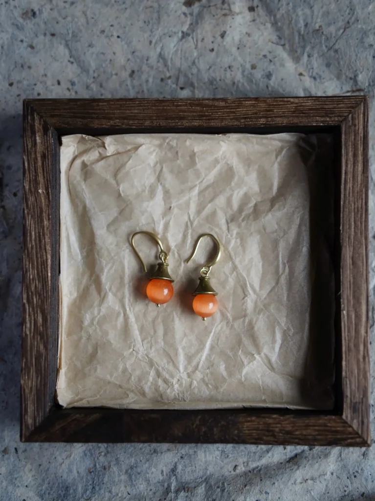 Handmade orange earrings with original design, a unique summer jewelry choice