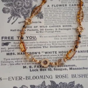 Glass bead necklace in botanical tones, handcrafted for vintage-inspired everyday styling