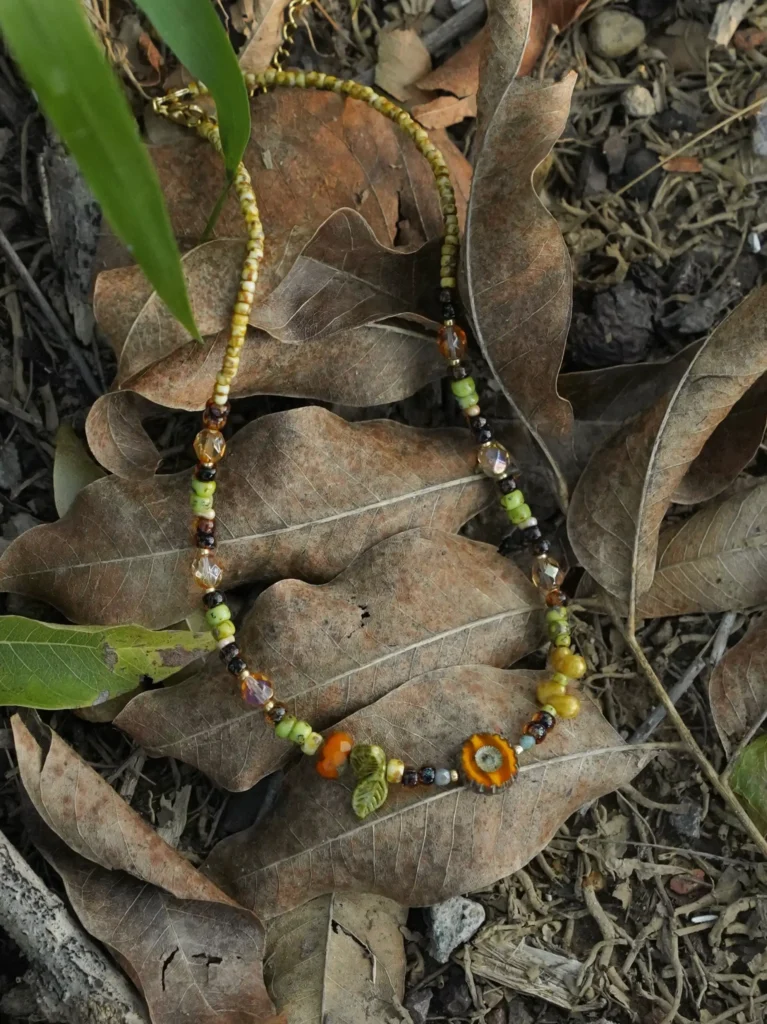 Unique glass bead necklace draws inspiration from nature and showcases vintage craftsmanship for women