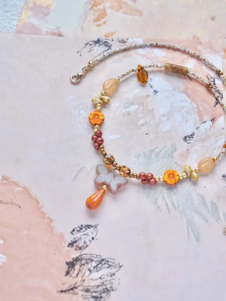 Handmade jewelry showcasing artisan-crafted necklaces, rings, and earrings with natural gemstones and intricate designs