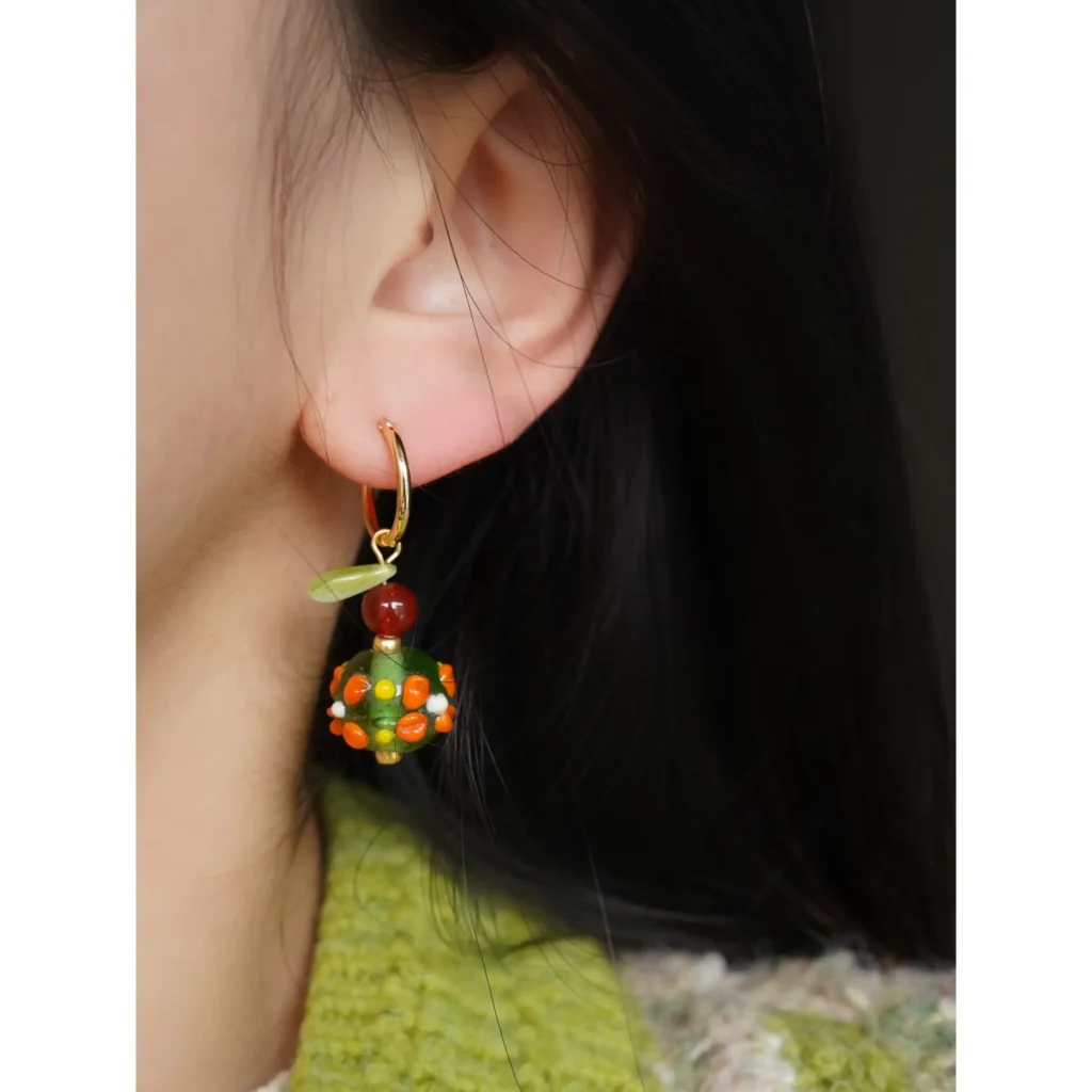 Vintage handmade hoop earrings with vibrant gemstone beads, available with stud posts or comfortable spring clip-ons.