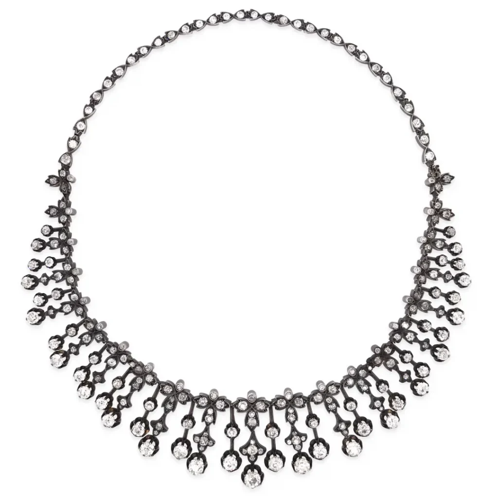 An illustration of a vintage diamond necklace from the Victorian era, featuring intricate designs and sparkling diamonds, reflecting the rise of diamonds as a dominant gemstone in the market during the late 19th century.