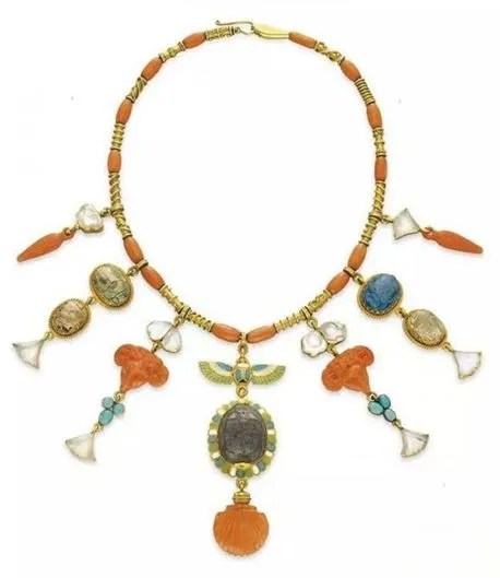An illustration of a vintage-inspired necklace from the Victorian era, showcasing intricate designs influenced by the archaeological revival trend of the time.