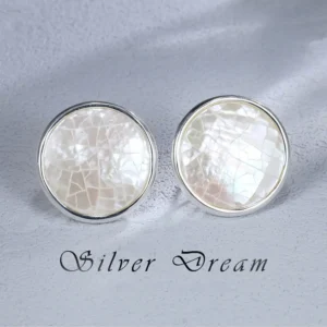 Mother-of-pearl stud earrings in 925 sterling silver add elegance to everyday outfits.