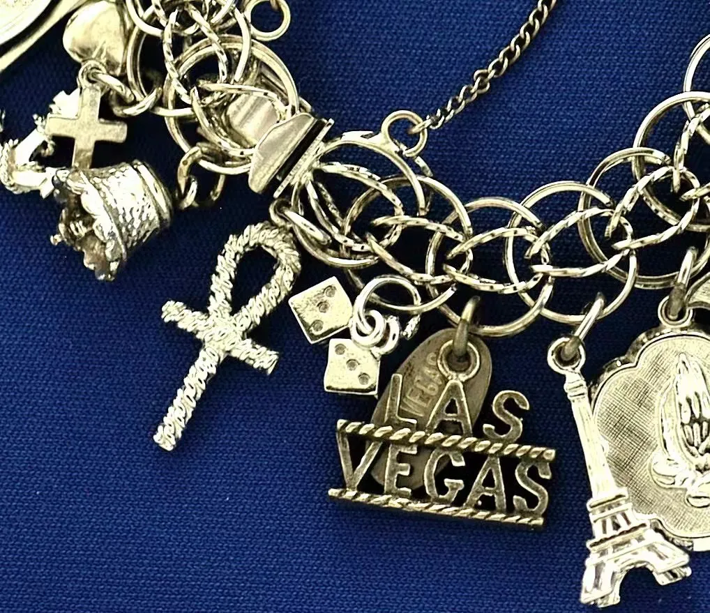 Illustration of vintage handmade jewelry adorned with sacred symbols and engravings, symbolizing spiritual power, divine protection, and blessings.