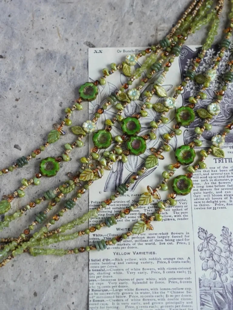 Handcrafted vintage Czech beads necklace with intricate beadwork and natural green tones.
