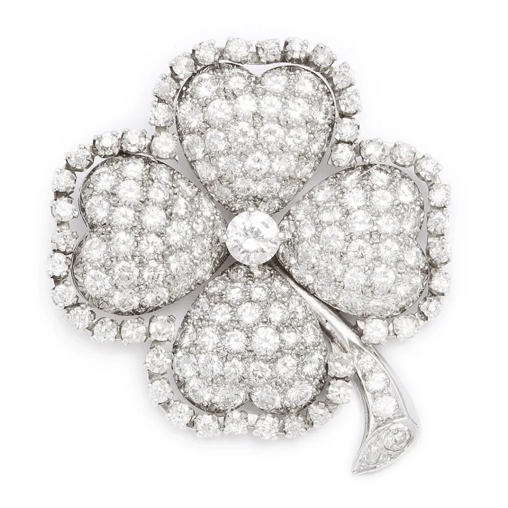 Vintage handcrafted platinum ring encrusted with diamonds, symbolizing elegance and timeless beauty.