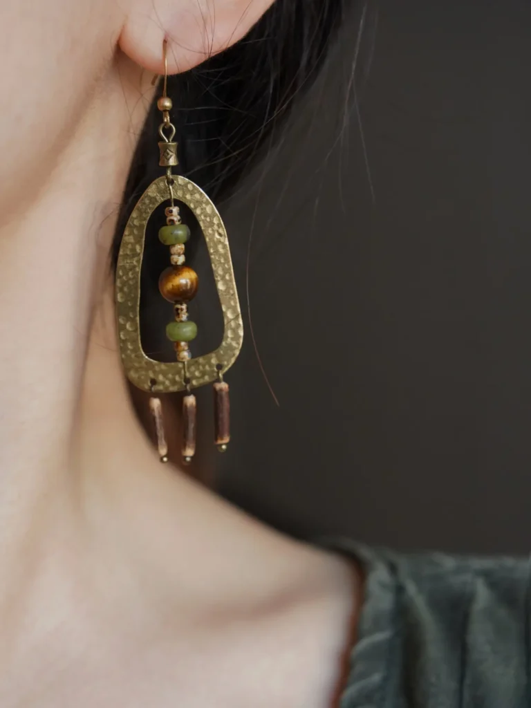 Vintage brass earrings with tiger’s eye and natural stones, handcrafted in an elegant wind-inspired design