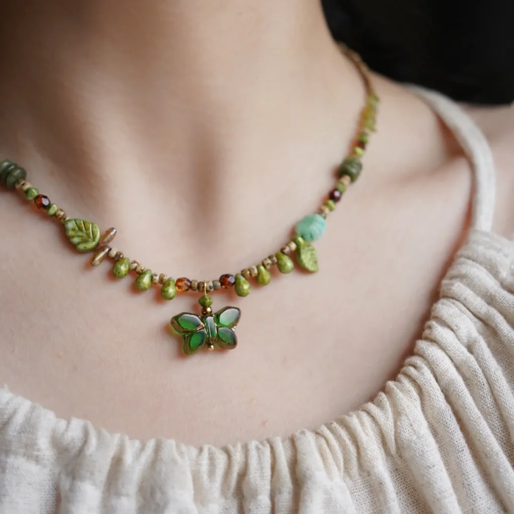 Model wearing a handcrafted necklace , showcasing its elegant, nature-inspired design.