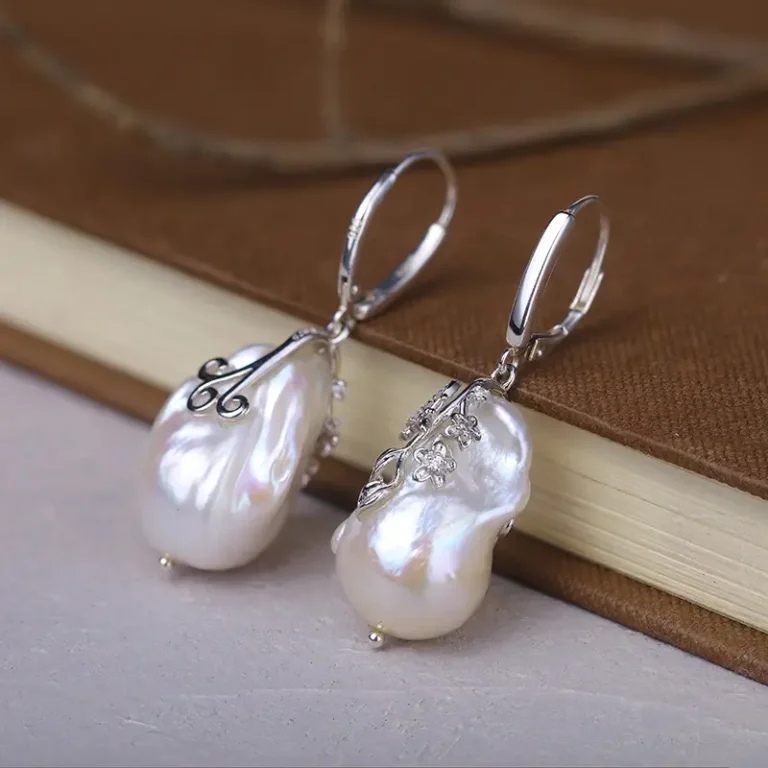 Pearl earrings paired with vintage 925 sterling silver hoops.