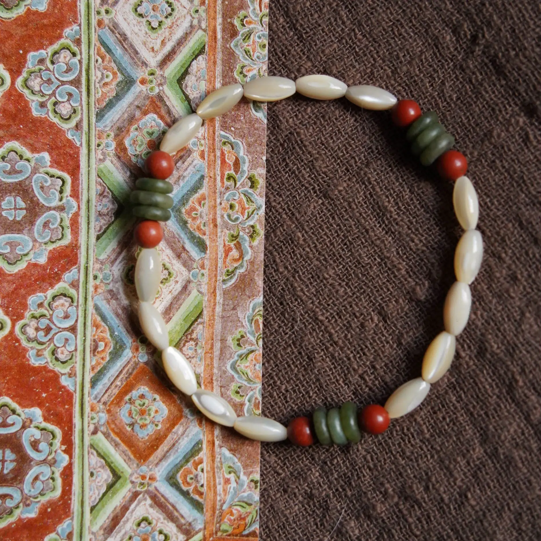 Handmade Dunhuang-inspired bracelet showcases traditional beadwork and Chinese cultural artistry as a wearable daily accessory.