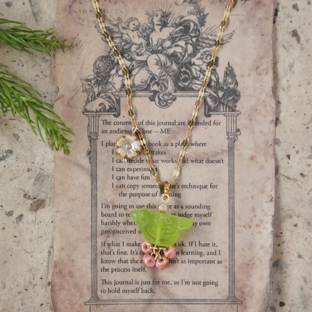 Green thorn bird necklace 