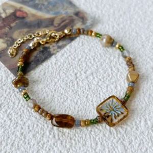 Handmade vintage beaded bracelet made with Czech beads, perfect for everyday stacking.