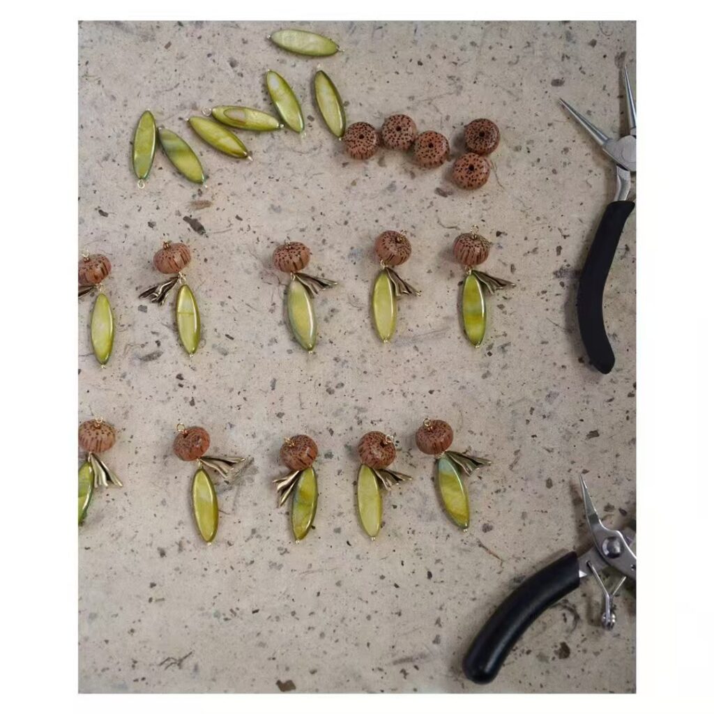 Handmade vintage earrings work in progress on Jewea workbench