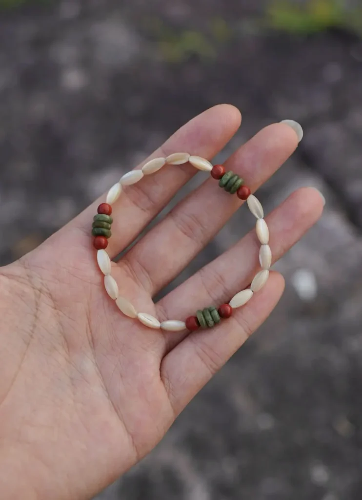 Handheld beaded bracelet showcases its delicate design and craftsmanship, perfect for layering or daily wear.