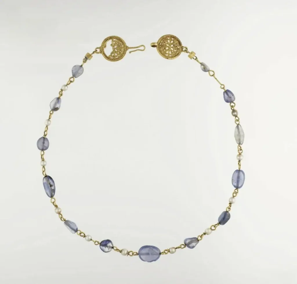 A Byzantine-inspired handmade vintage necklace from the Pantalica Treasure, adorned with sapphires and pearls for timeless elegance.
