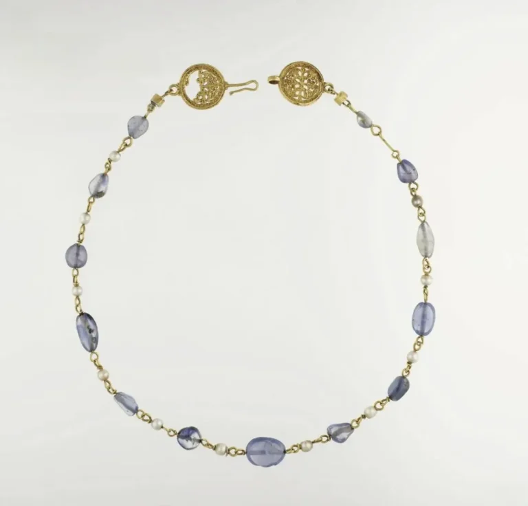 A Byzantine-inspired handmade vintage necklace from the Pantalica Treasure, adorned with sapphires and pearls for timeless elegance.