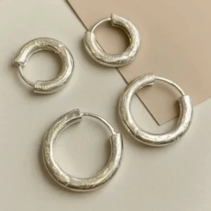 Handcrafted 925 sterling silver hoop earrings for minimalist everyday style.