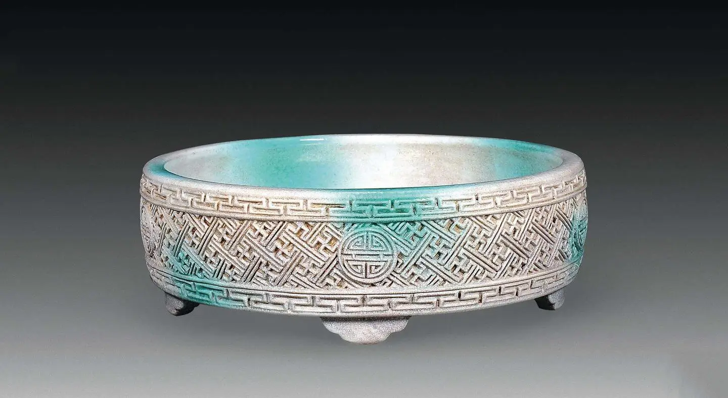 Qing dynasty blown glaze basin with Wan character pattern, featuring traditional Chinese decorative motifs for cultural and artistic appreciation.