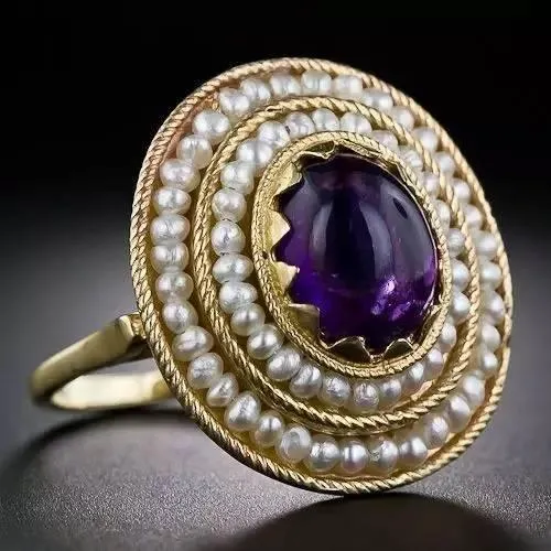 An ornament featuring a beautiful cluster of amethysts and pearls.