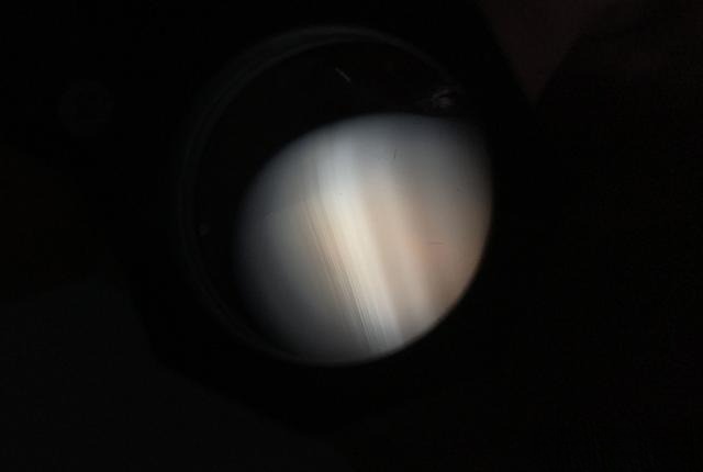 Detailed microscopic image of Brazilian purple agate highlighting its cryptocrystalline structure and subtle band patterns