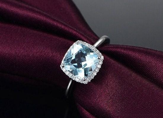 An elegant aquamarine ring with soft blue gemstone sparkle