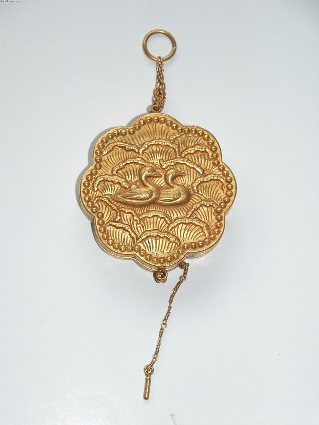 Metal pendant featuring detailed chasing engraving, showcasing Jewelry Metal Texturing Techniques