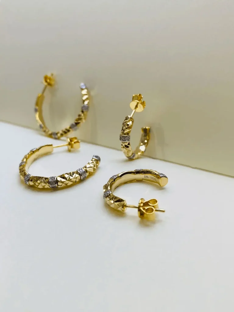 Gold 925 silver earrings feature a sparkling broken ice finish for everyday wear.