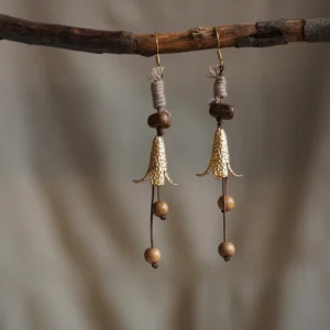Vintage Wabi-Sabi Earrings with natural wooden beads for stylish autumn outings.