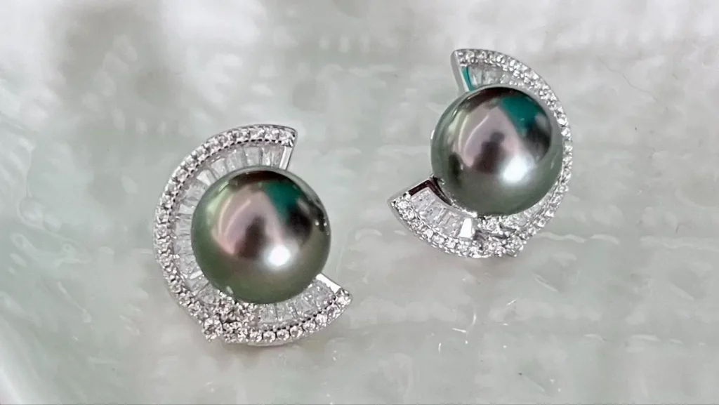 High-quality black pearl stud earrings with deep luster and smooth surface