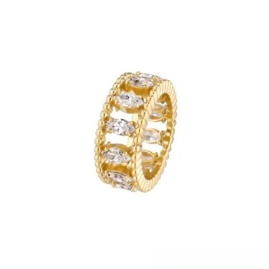 This light-luxury gold double-band ring is complemented by smaller accent diamonds, creating a refined layered look.