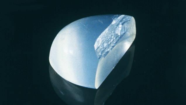 Close-up of a moonstone cleavage surface, highlighting its delicate structure; avoid impact to prevent damage.