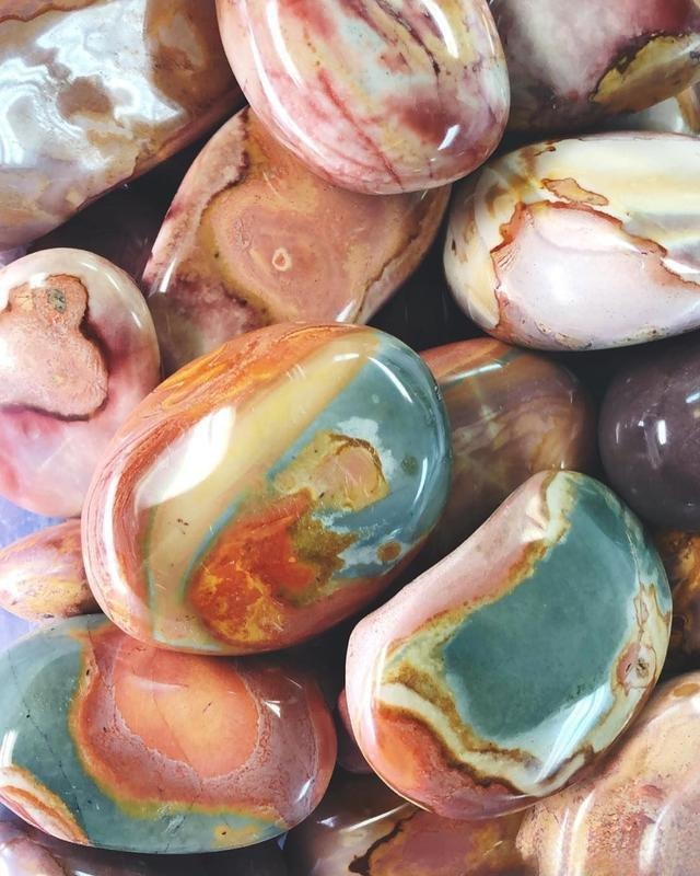 Multicolor Jasper with various colors mixed together, often used for vibrant carved artworks due to color distribution and contrast