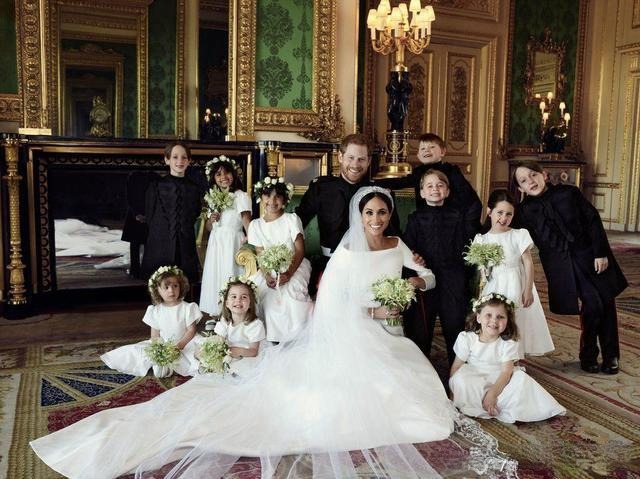 Prince Harry and Meghan Markle wedding with flower girls walking together