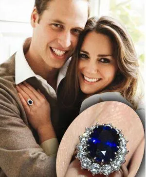 A detailed photo of Princess Diana's famous 18-carat sapphire ring, a classic oval-shaped sapphire surrounded by a cluster of diamonds, now worn by Catherine, Princess of Wales.
