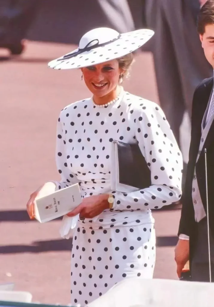 An illustration of Princess Diana wearing a classic polka dot outfit, showcasing her elegant and vibrant personal style.