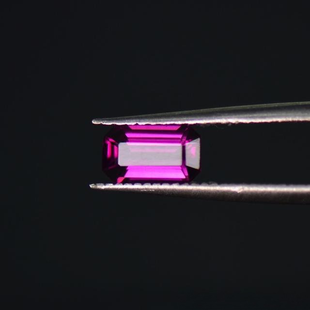 Pyrope garnet gemstone showing vivid red to purplish-red color in the garnet family gemstone guide