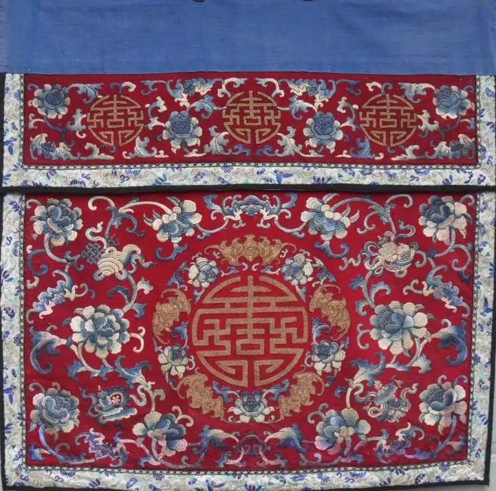 Qing dynasty table cover embroidered in gold and blue featuring the Five Blessings Holding Longevity motif symbolizing prosperity and long life