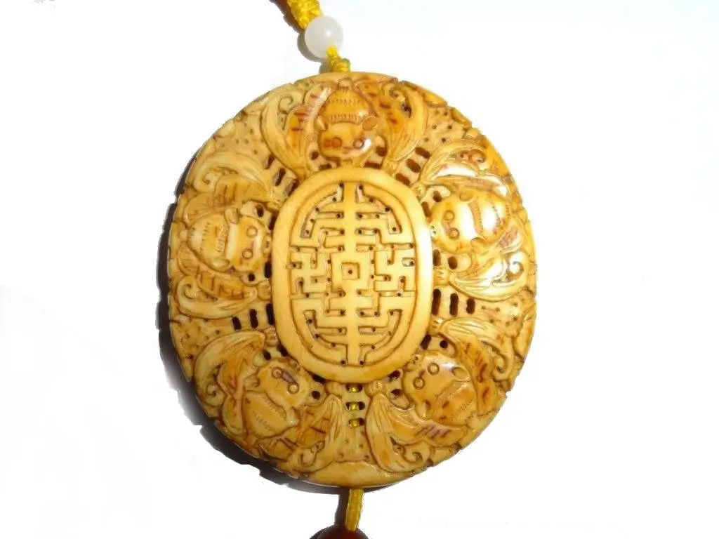 Antique Republic of China carved pendant featuring the Five Blessings Holding Longevity motif with intricate openwork design